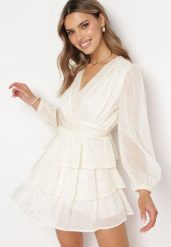 Jasnobeżowa Mini Sukienka Rozkloszowana z Metalicznym Nadrukiem i Falbankami Elawnia. Brązowe sukienki damskie Born2be, bez wzorów, eleganckie, bez ramiączek. W wyprzedaży za 118.99 zł.