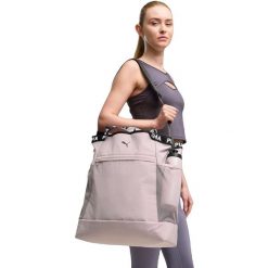 Torba damskie Puma At Ess Tote Bag 26.5L. Fioletowe torby sportowe Puma, bez wzorów, z materiału. Za 290.00 zł.