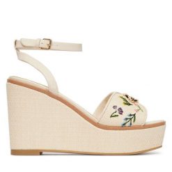 Sandały Aldo. Brązowe sandały damskie ALDO, bez wzorów, bez obcasa, na koturnie, bez zapięcia. Za 419.99 zł.