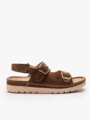 Brązowe sandały z dwoma paskami na rzep. Brązowe sandały damskie Ryłko, bez wzorów, ze skóry, z okrągłym noskiem, bez obcasa, na obcasie, bez zapięcia. Za 429.99 zł.