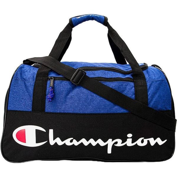Torba Champion Utility Medium Duffel 52L. Niebieskie torby sportowe Champion, bez wzorów, z materiału. Za 94.99 zł.
