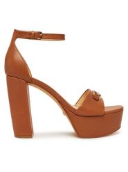 Guess Sandały FLJSET LEA03 Brązowy. Brązowe sandały damskie Guess, z aplikacjami, ze skóry, bez obcasa, na słupku, bez zapięcia. Za 499.99 zł.
