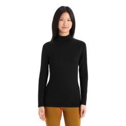 Koszulka z długim rękawem Damska Icebreaker 260 Tech LS Turtleneck. Czarne bluzki damskie Icebreaker, xl, bez wzorów, z wełny, bez kołnierzyka, bez ramiączek. Za 510.45 zł.