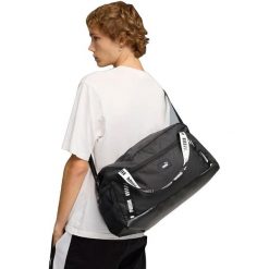 Torba Puma Phase Tape Small Sports Bag 22L. Czarne torby sportowe Puma, bez wzorów, z materiału. Za 290.00 zł.