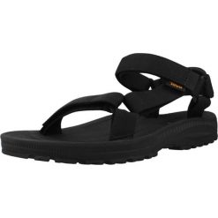 Sandały TEVA W WINSTED Czarny. Czarne sandały damskie Teva, bez wzorów, z syntetyku, bez obcasa, bez zapięcia. Za 277.99 zł.