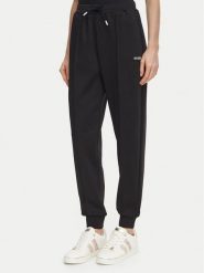 Guess Spodnie dresowe V6BB17 K6344 Czarny Regular Fit. Czarne spodnie dresowe damskie Guess, xxs, z aplikacjami, z dresówki. Za 344.99 zł.