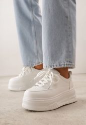 Białe Sneakersy VICES na Grubej Podeszwie z Tłoczeniami Azirara. Białe obuwie sportowe damskie Born2be, z jeansu, bez zapięcia, na golfa. Za 99.99 zł.