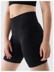 4F Szorty funkcyjne w kolorze czarnym rozmiar: M/L. Czarne spodenki sportowe damskie 4F, l, bez wzorów, z materiału, na fitness i siłownię. Za 37.30 zł.