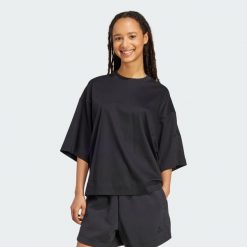 Luźna koszulka Soft Lux. Czarne bluzki damskie Adidas, xs, bez wzorów, sportowe, bez kołnierzyka, bez ramiączek. Za 199.00 zł.