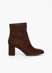 Krótkie botki marki Marco Tozzi z elastyczną cholewką. Brązowe botki damskie bonprix, bez obcasa, bez zapięcia. Za 239.99 zł.