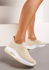 Beżowe Wsuwane Buty Sportowe na Koturnie z Perforacją Mellarina. Brązowe obuwie sportowe casual damskie Born2be. Za 44.99 zł.