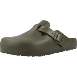 Klapki Birkenstock Boston Eva Damskie. Brązowe kapcie damskie Birkenstock, bez wzorów, z materiału, bez obcasa, bez zapięcia. Za 329.40 zł.