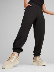 Puma Spodnie dresowe "Infuse" w kolorze czarnym rozmiar: M. Czarne spodnie dresowe damskie Puma, m, bez wzorów, z dresówki. Za 135.49 zł.