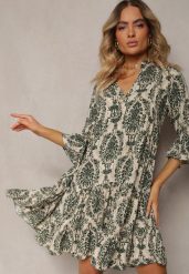 Zielona Sukienka z Bawełny o Rozkloszowanym Kroju Wykończona Falbanką Niloa. Zielone sukienki damskie Renee, bez wzorów, z bawełny, eleganckie, bez ramiączek. W wyprzedaży za 43.99 zł.