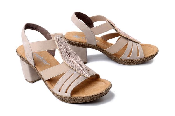 Rieker 66526-62 beige, sandały damskie. Brązowe sandały damskie Rieker, bez wzorów, ze skóry ekologicznej, bez obcasa, na obcasie, bez zapięcia. Za 223.93 zł.