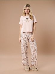 Bawełniana piżama dwuczęściowa z psim motywem - różowy. Czerwone piżamy damskie Sinsay, bez wzorów, z bawełny, bez ramiączek. Za 49.99 zł.