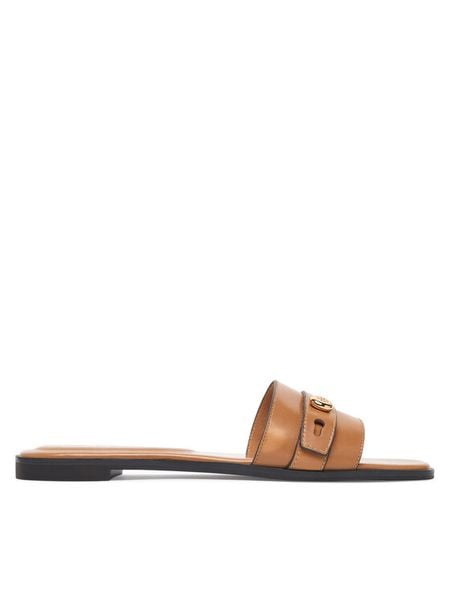 Tory Burch Klapki Romy Slide 183305 Brązowy. Brązowe klapki damskie Tory Burch, bez wzorów, ze skóry, bez obcasa, bez zapięcia. Za 1,524.00 zł.