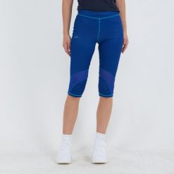 Legging 3/4 do treningu ASYR damskie. Niebieskie spodnie dresowe damskie ELPLAYER, bez wzorów, z dżerseju. W wyprzedaży za 76.50 zł.
