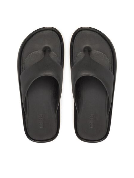 Melissa Japonki Float Ad. 33915 Czarny. Czarne klapki damskie Melissa, bez wzorów, z tworzywa sztucznego, bez obcasa, bez zapięcia. Za 399.99 zł.