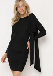Czarna Dopasowana Brokatowa Sukienka z Wiskozą Ozdobiona Kokardą na Ramieniu liala. Czarne sukienki damskie Born2be, bez wzorów, z wiskozy, eleganckie, bez ramiączek. W wyprzedaży za 144.49 zł.