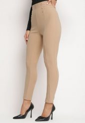 Beżowe Bawełniane Legginsy z Wysokim Stanem i Ozdobnymi Guzikami Rielina. Brązowe legginsy damskie Born2be, l, bez wzorów, z bawełny. Za 39.99 zł.