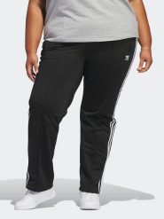 Adidas Spodnie dresowe w kolorze czarnym rozmiar: 2X. Czarne spodnie dresowe damskie Adidas, bez wzorów, z dresówki. Za 182.72 zł.