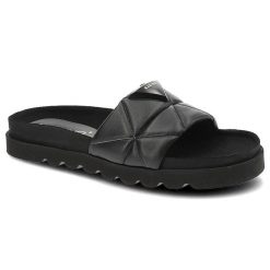 Czarne Klapki Karino Modne Skórzane Buty. Czarne klapki damskie Karino, z aplikacjami, ze skóry, bez obcasa, bez zapięcia. Za 215.00 zł.