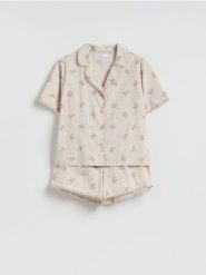 Popelinowa piżama z misiem - kremowy. Białe piżamy damskie Reserved, bez wzorów, z bawełny, bez ramiączek. Za 129.99 zł.