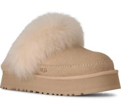 Damskie japonki W DISQUETTE CHALET. Brązowe klapki damskie Ugg, bez wzorów, z materiału, bez obcasa, bez zapięcia. Za 556.20 zł.