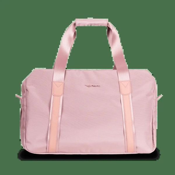 WINGS Torba sportowo - podróżna SKYLARK pink. Czerwone torby podróżne Wings, w ażurowe wzory, z materiału, duże. Za 149.90 zł.