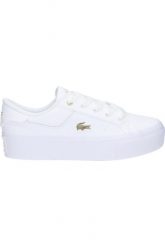 Tenisówki Lacoste Model Ziane Kolor Biały. Białe trampki damskie Lacoste, bez wzorów, ze skóry, bez zapięcia. Za 429.00 zł.