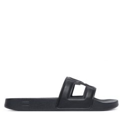 Klapki Tommy Hilfiger. Czarne klapki damskie Tommy Hilfiger, bez wzorów, bez obcasa, bez zapięcia. Za 189.99 zł.
