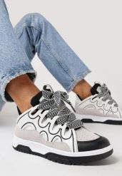 Białe Sneakersy z Przeszyciami i Szerokim Wiązaniem Leontine. Białe obuwie sportowe damskie Born2be, bez zapięcia. Za 109.99 zł.