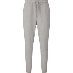 Damskie spodnie dresowe Athlecia Jacey V2. Fioletowe spodnie dresowe damskie Athlecia, bez wzorów, z dresówki. Za 246.00 zł.