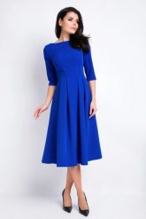 Elegancka sukienka rozkloszowana z kontrafałdami niebieska. Niebieskie sukienki damskie Sukienki.shop, bez wzorów, biznesowe, bez ramiączek. Za 349.00 zł.