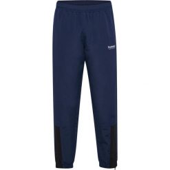 Spodnie dresowe Hummel hmlTRACKSUIT. Niebieskie spodnie sportowe damskie Hummel, s, bez wzorów, z dresówki, na fitness i siłownię. Za 227.50 zł.