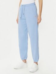 Guess Jeans Spodnie dresowe W4YB33 KC811 Niebieski Regular Fit. Niebieskie spodnie dresowe damskie Guess Jeans, l, z aplikacjami, z dresówki. Za 189.99 zł.