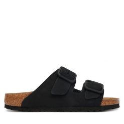 Klapki Birkenstock. Czarne klapki damskie Birkenstock, bez wzorów, bez obcasa, bez zapięcia. Za 629.99 zł.