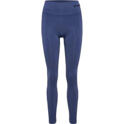 Damskie legginsy bezszwowe z wysoką talią Hummel TIF. Niebieskie legginsy sportowe damskie Hummel, bez wzorów, z podwyższonym stanem, na jogę i pilates. Za 164.00 zł.