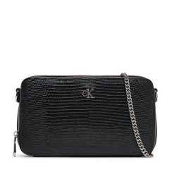 Torebka Calvin Klein. Czarne torebki wieczorowe damskie Calvin Klein, bez wzorów, bez dodatków. Za 239.99 zł.