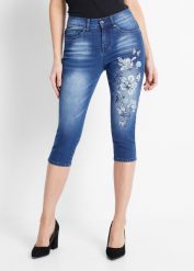 Dżinsy rybaczki z nadrukiem w motyle. Niebieskie jeansy damskie bonprix. Za 127.99 zł.