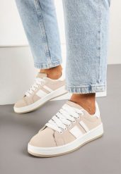 Beżowe Sneakersy na Płaskiej Podeszwie Ozdobione Paskami Ravesi. Brązowe obuwie sportowe damskie Born2be, z jeansu, bez zapięcia. Za 74.99 zł.