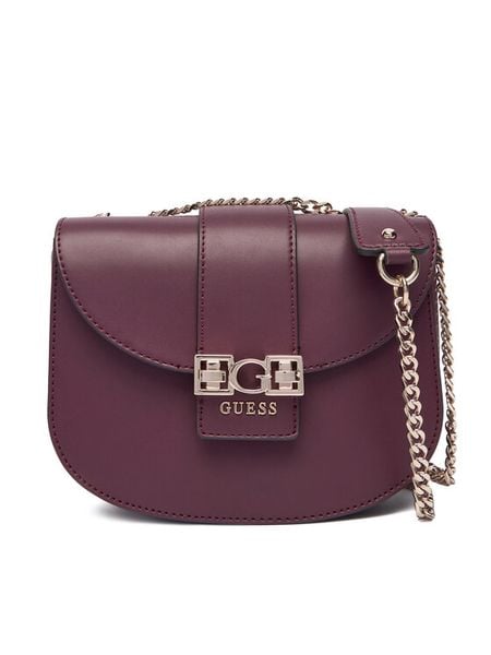 Guess Torebka HWVG98 91210 Fioletowy. Fioletowe torebki wieczorowe damskie Guess, z aplikacjami, ze skóry, bez dodatków. Za 439.99 zł.