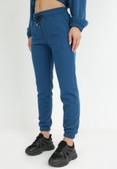 Ciemnoniebieskie Spodnie Dresowe z Tłoczeniem Faboto. Niebieskie spodnie dresowe damskie Born2be, s, bez wzorów, z dresówki. Za 74.99 zł.