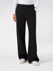 Champion Spodnie dresowe w kolorze czarnym rozmiar: XL. Czarne spodnie dresowe damskie Champion, xl, bez wzorów, z dresówki. Za 149.95 zł.