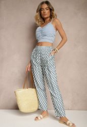 Niebieskie Spodnie o Szerokim Kroju High Waist w Romby Sarriza. Niebieskie spodnie materiałowe damskie Renee, z aplikacjami, z jeansu. Za 39.99 zł.