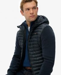 Superdry Kurtka Hooded Storm Fleece Hybrid – Slim fit, pikowany przód. Niebieskie kurtki damskie Superdry, l, bez wzorów, z polaru, bez kaptura. Za 545.65 zł.