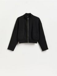 Bluza z ażurowymi wstawkami - czarny. Czarne bluzy damskie Reserved, l, w ażurowe wzory, z bawełny, bez kaptura. Za 99.99 zł.