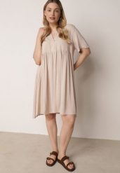 Beżowa Rozkloszowana Sukienka w Koszulowym Stylu z Bawełny Normae. Brązowe sukienki damskie Born2be, bez wzorów, z bawełny, biznesowe, bez ramiączek. Za 89.99 zł.