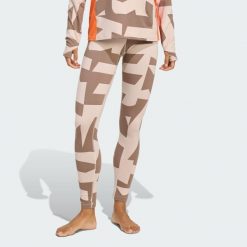 Legginsy Multi Synthetic Base Layer. Brązowe legginsy damskie Adidas, uniwersalny, bez wzorów. Za 219.00 zł.